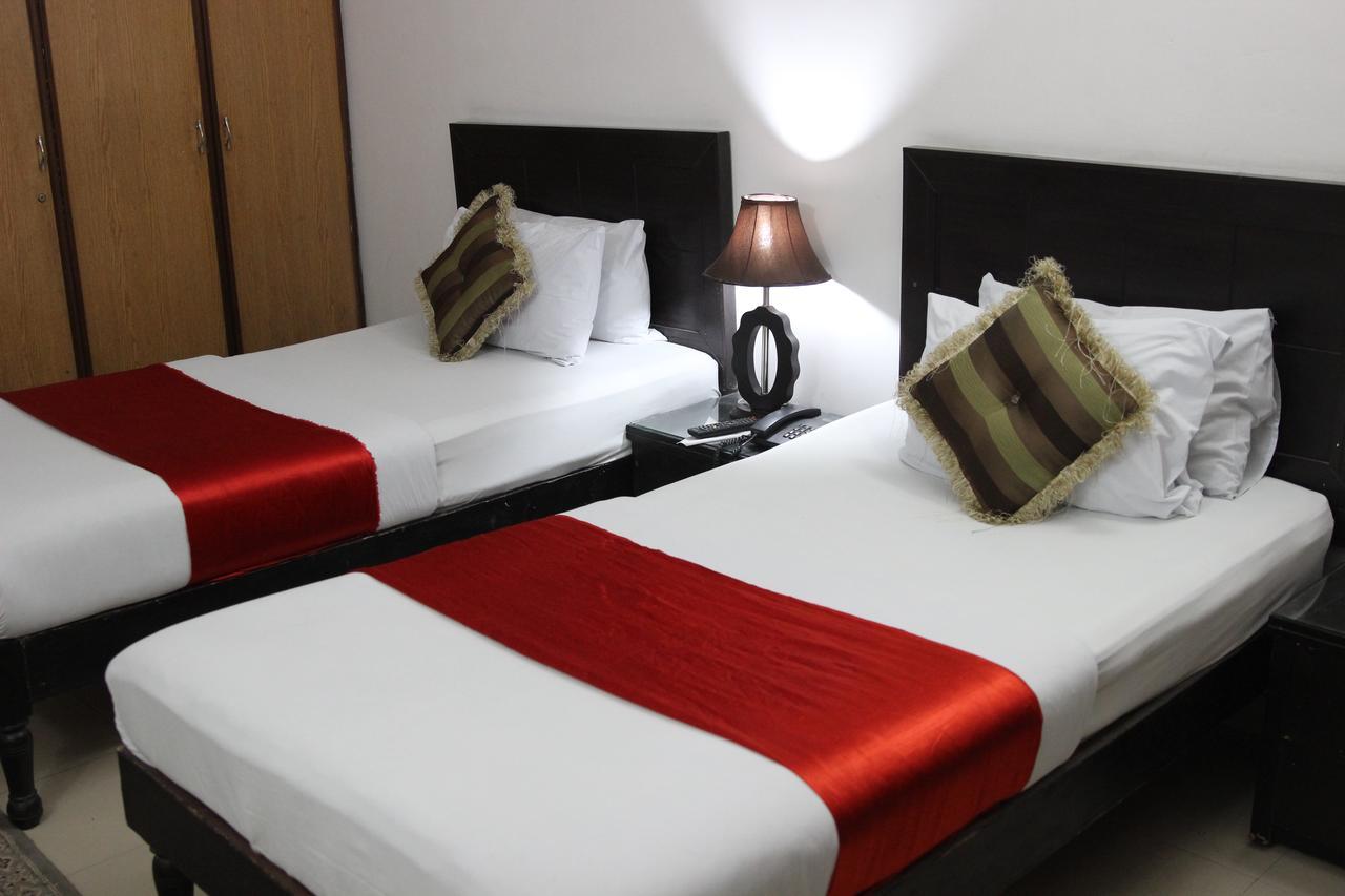 Tourist Inn Hotel Лахор Экстерьер фото